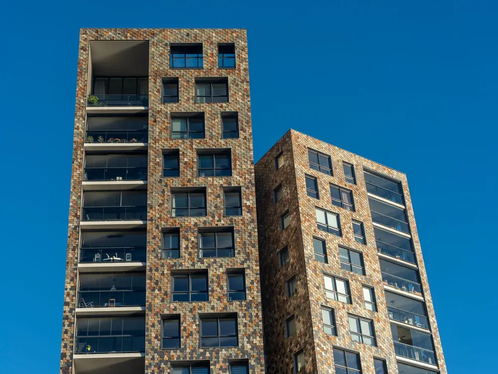Modern residential tower against the sky
