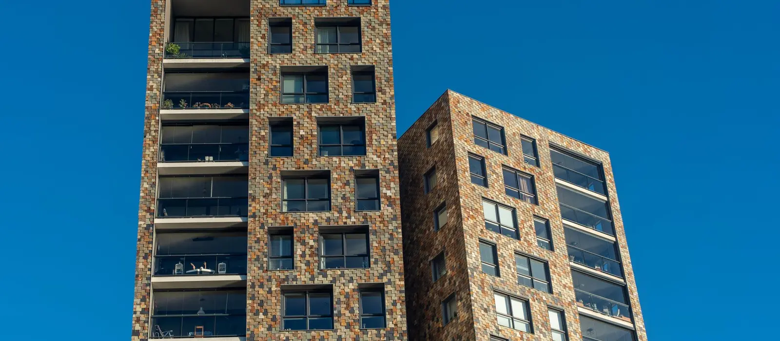 Modern residential tower against the sky