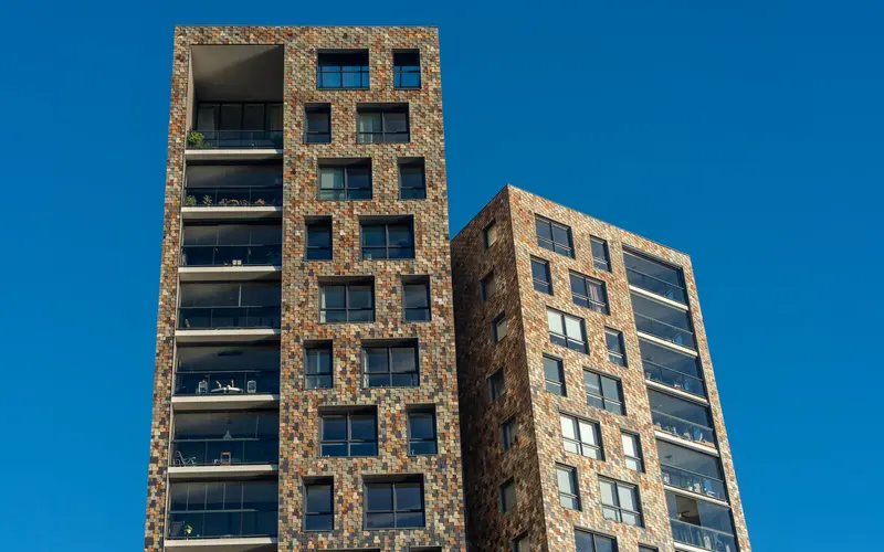 Modern residential tower against the sky