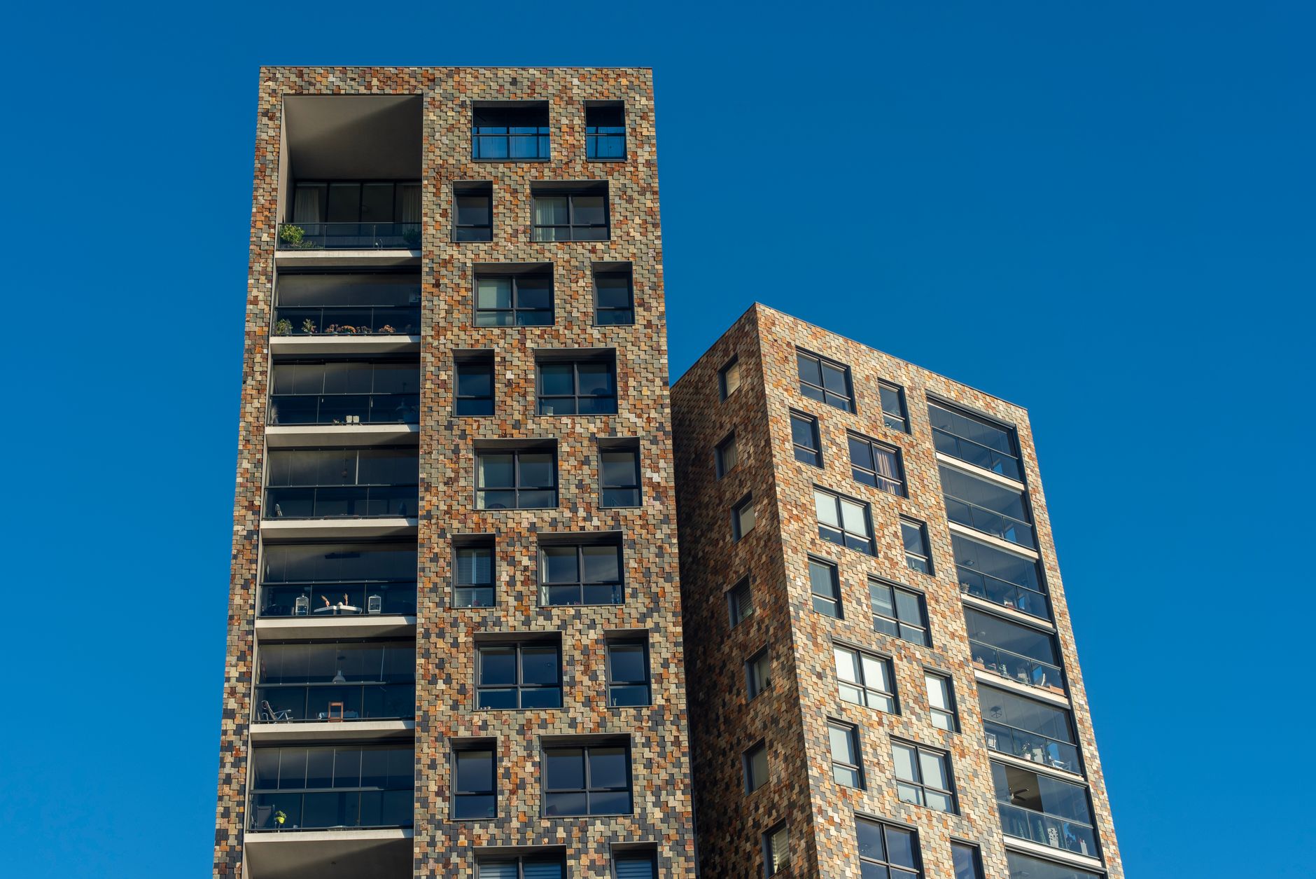 Modern residential tower against the sky